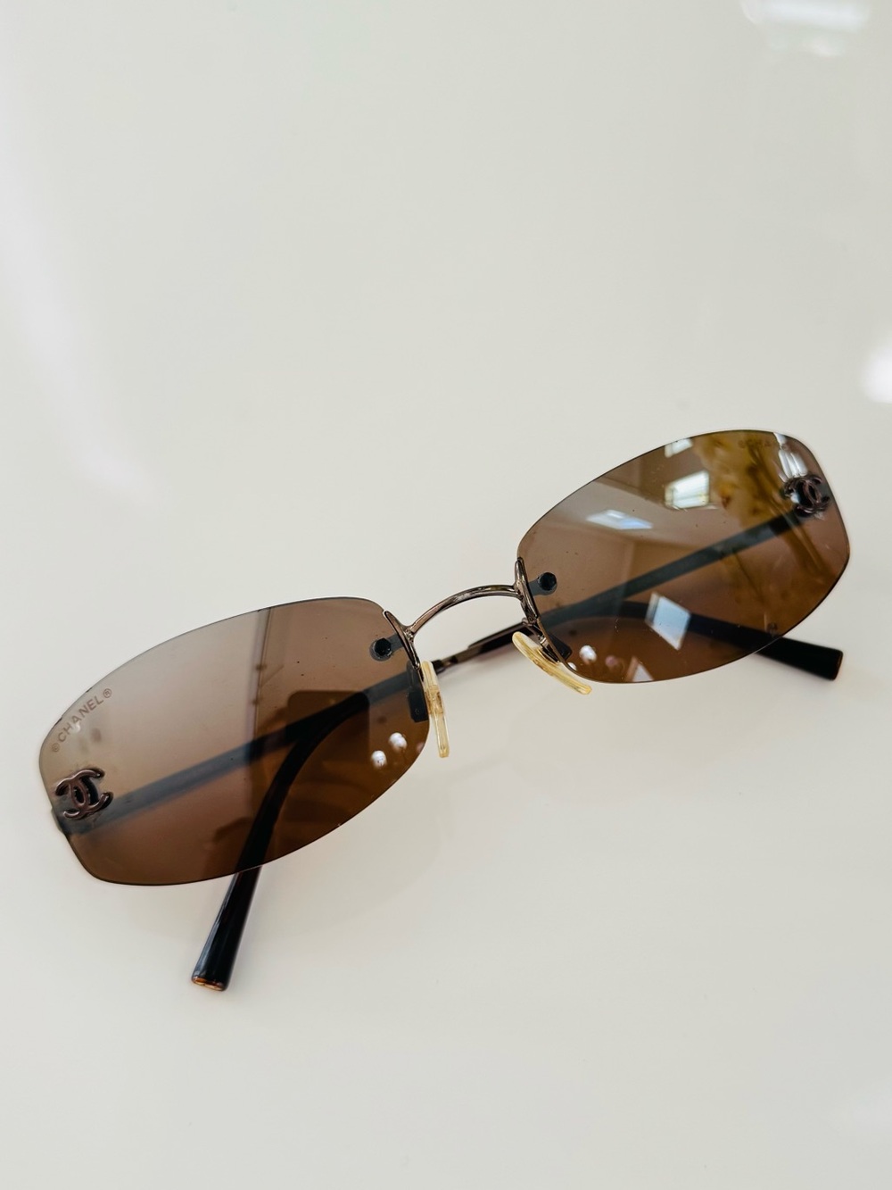 RARE✨ Vintage Chanel brown gradient mirror rimless sunglasses.